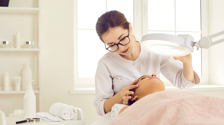 dermatologist with patient