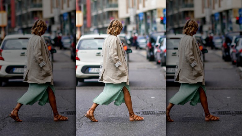 woman wearing brown gladiator sandals