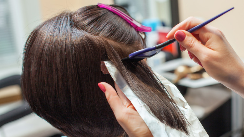 coloring hair at salon