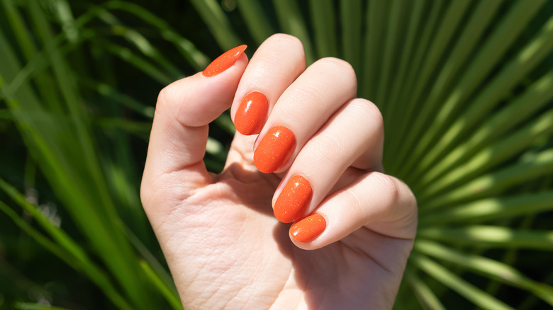 Orange nails suit the fall season