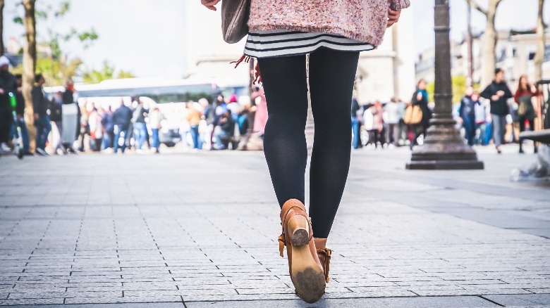 Woman in leggings walking