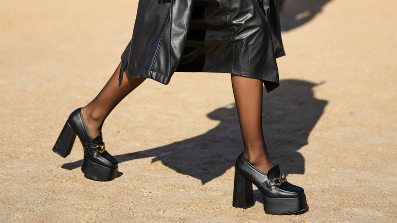 Woman wearing black mary janes