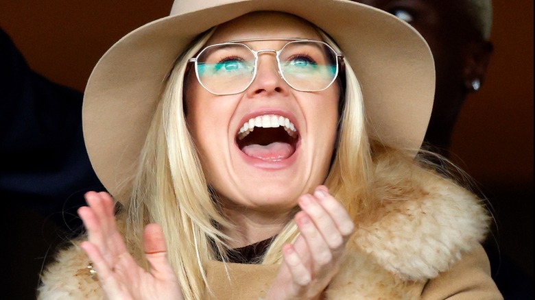 Alice Eve wearing aviator eyeglasses