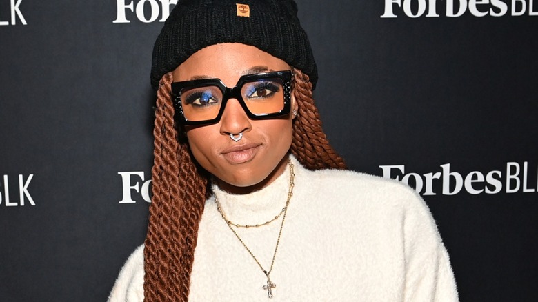 Nneka Onuorah wearing thick-framed glasses