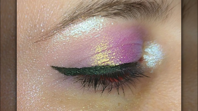 Eyelid with pink sparkly eyeshadow