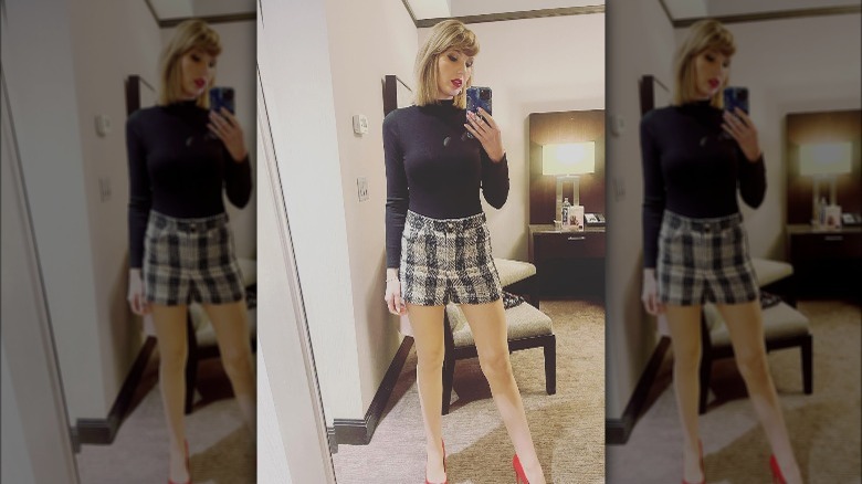 Taylor Swift wearing plaid shorts