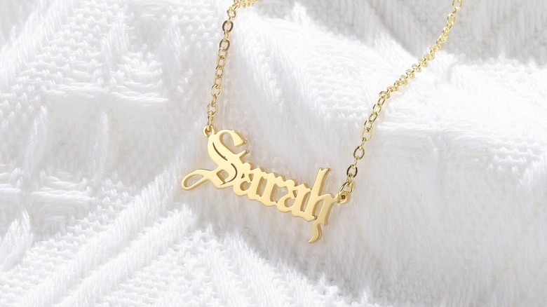 gold necklace with the name Sarah