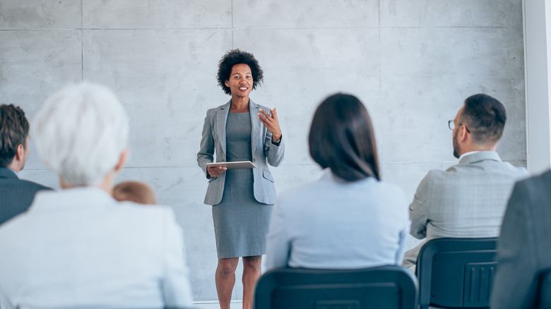 person giving presentation at work