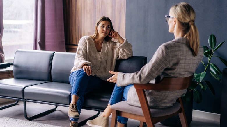 Woman and therapist talking