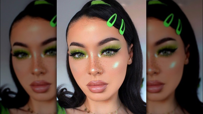 Girl with green makeup look