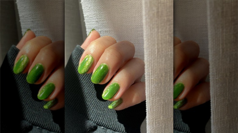 Glittery green nails