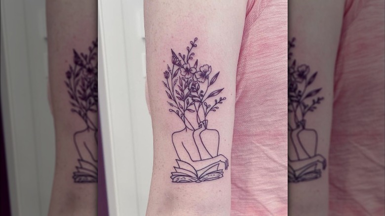 flower girl with book tattoo