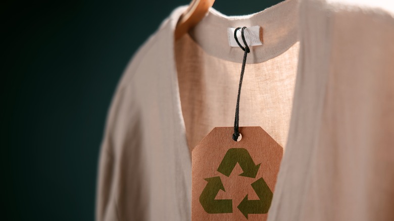 Sweater with recycling tag