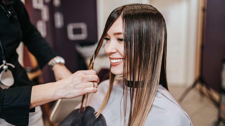 woman getting haircut