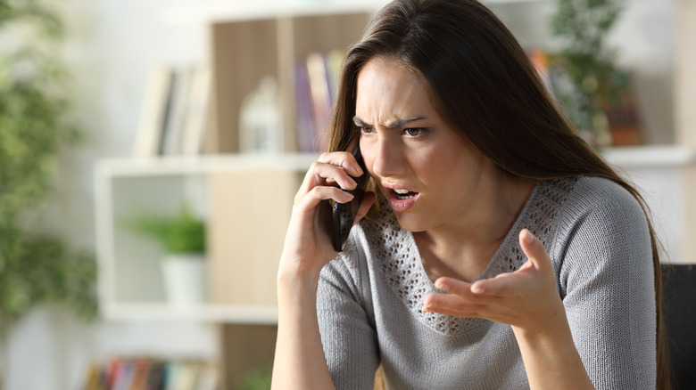 woman complaining on phone