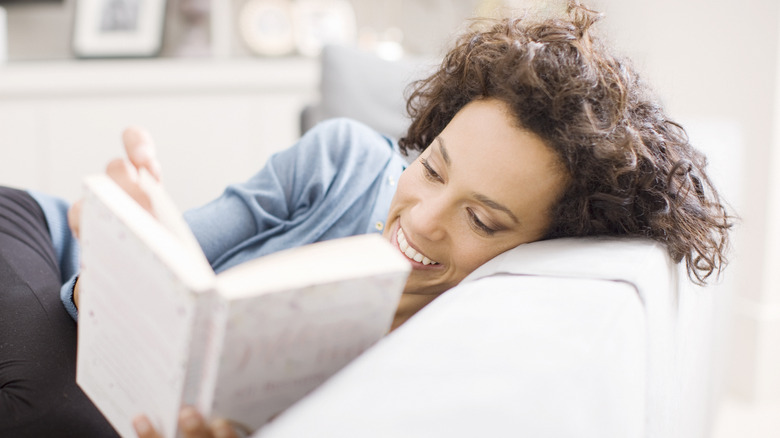 woman reading book