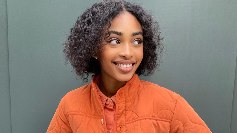 Woman with curly hair bob