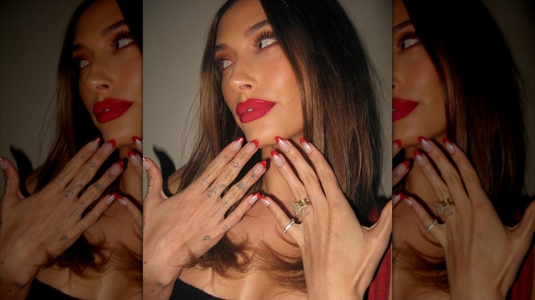 Hailey Bieber with red nails