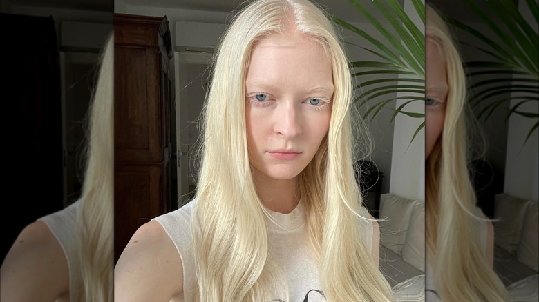 A woman with platinum blond hair