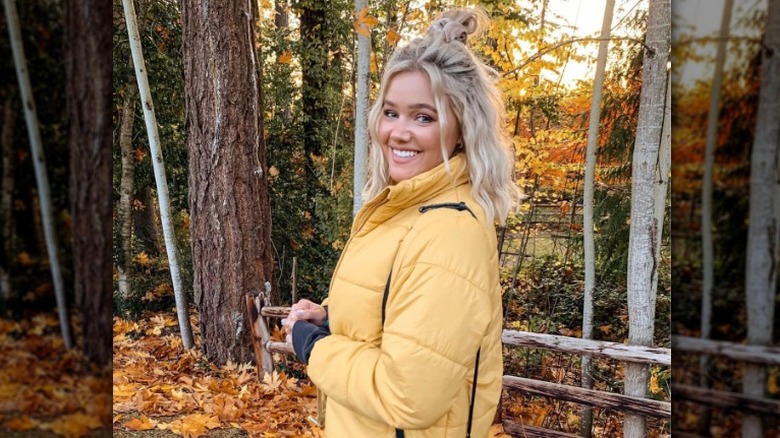 Woman with half up bun crimped hair 