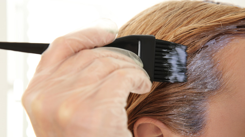 Woman with hair bleach