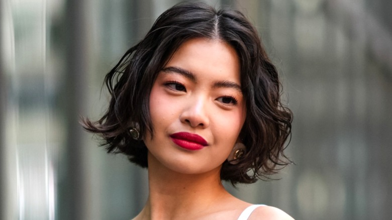 Woman with short textured bob haircut