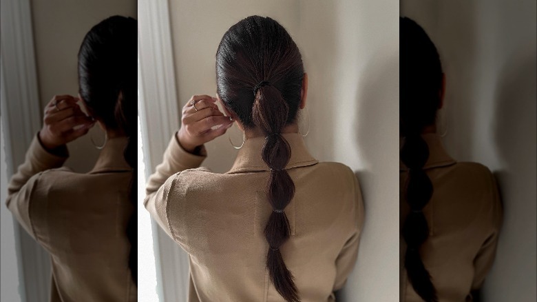 woman wearing bubble ponytail