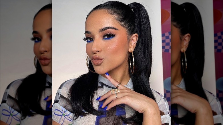 Becky G with half-up, half-down pigtails