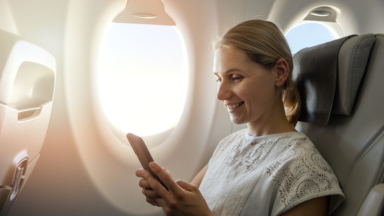 woman with ponytail on plane