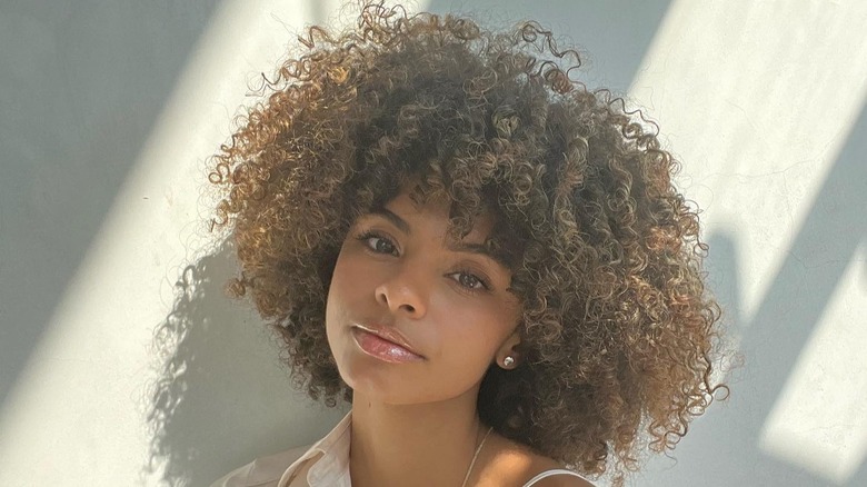 Woman with natural curly hair