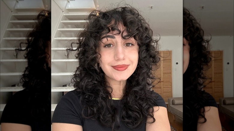 Curly shag haircut and bangs