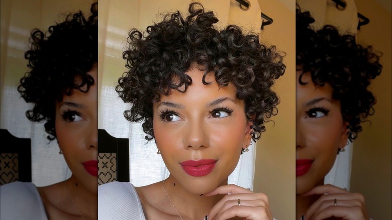 woman with curly pixie cut