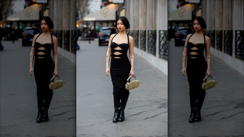 woman wearing black halter dress