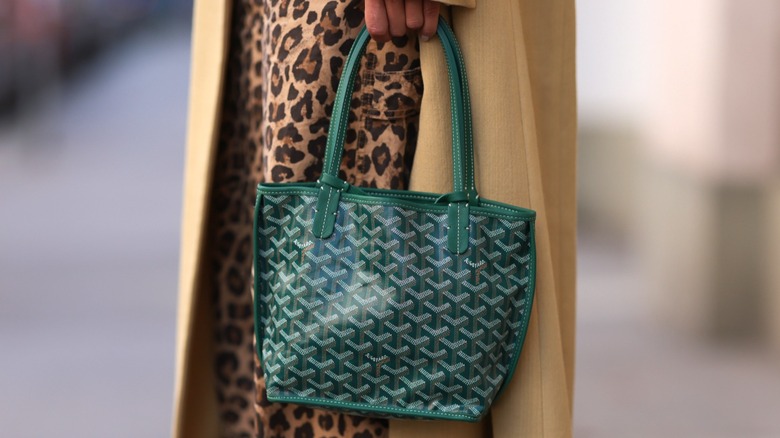 Green Goyard logo bag