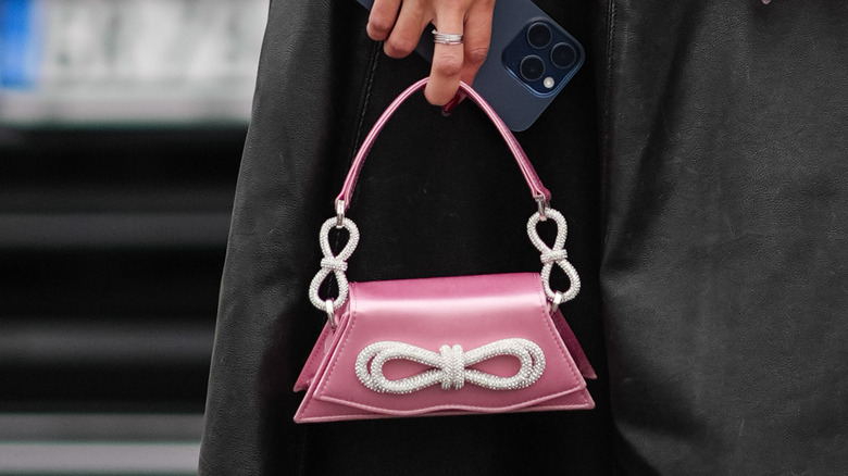 Miniature pink handbag with white bow