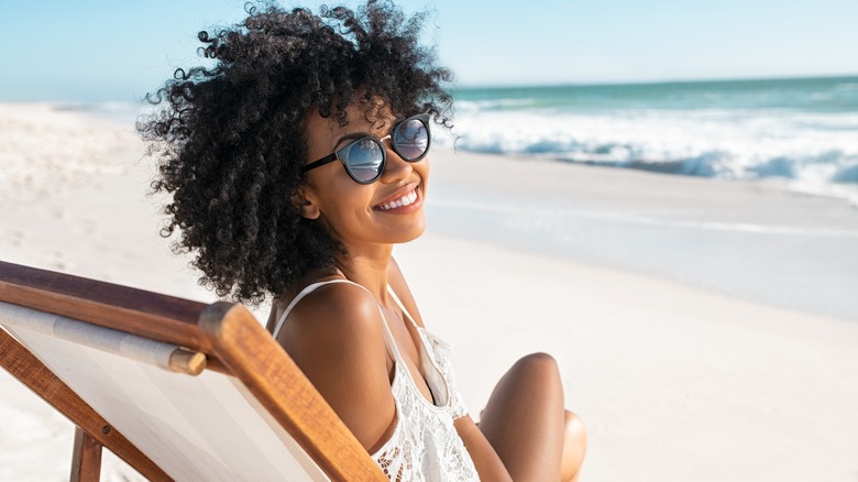 Confident woman on beach