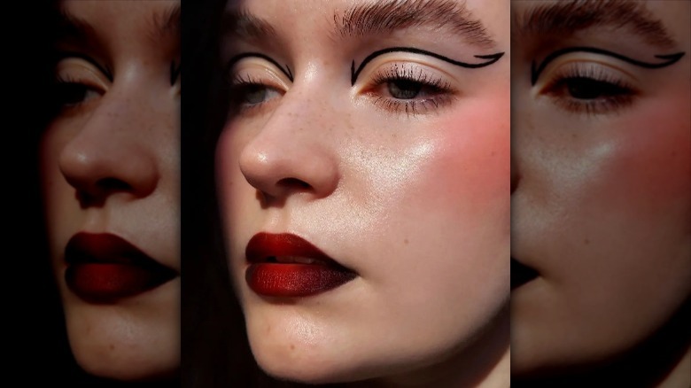 Dark red lipstick