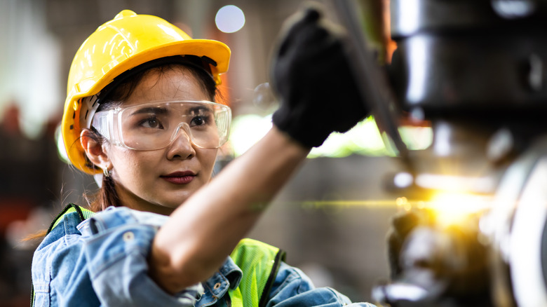 Machine worker in factory