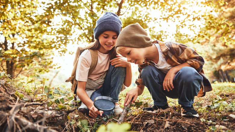 Two kids exploring outdoors