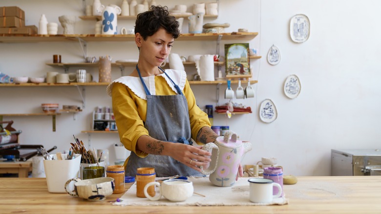 woman admiring her pieces