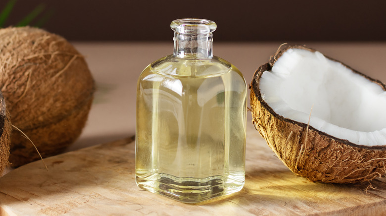 Glass bottle of coconut oil