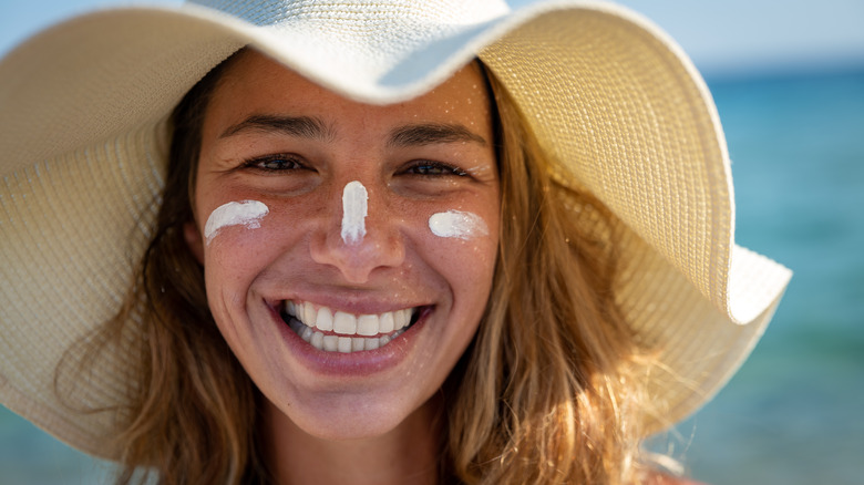 young woman wearing sunscreen