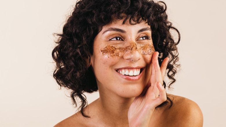 Woman doing skincare exfoliation