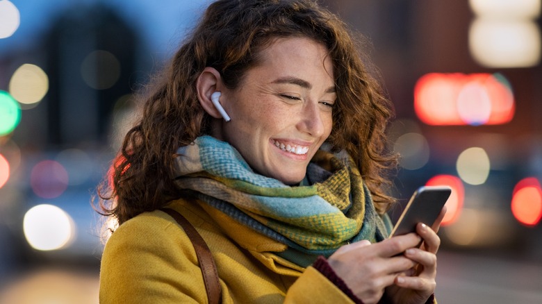 woman sending text