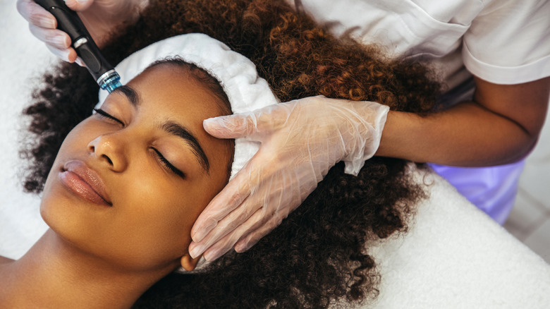 woman receiving a skincare treatment