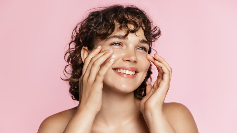 woman with curly hair and beautiful skin