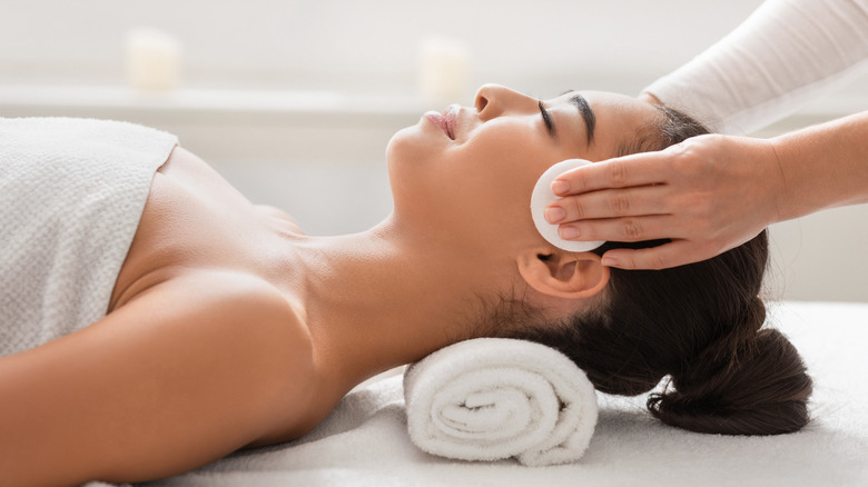 Woman enjoying facial massage