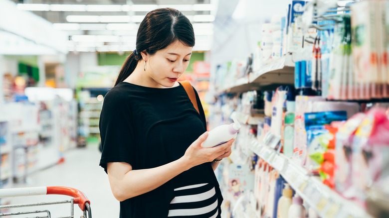 Woman shopping for cosmetics