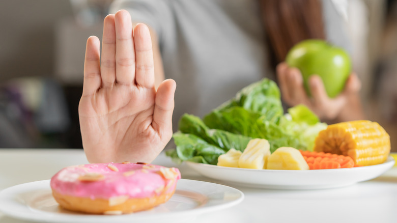 Person avoiding junk food