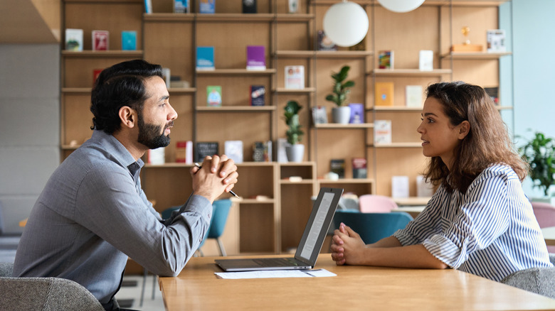 two people talking together